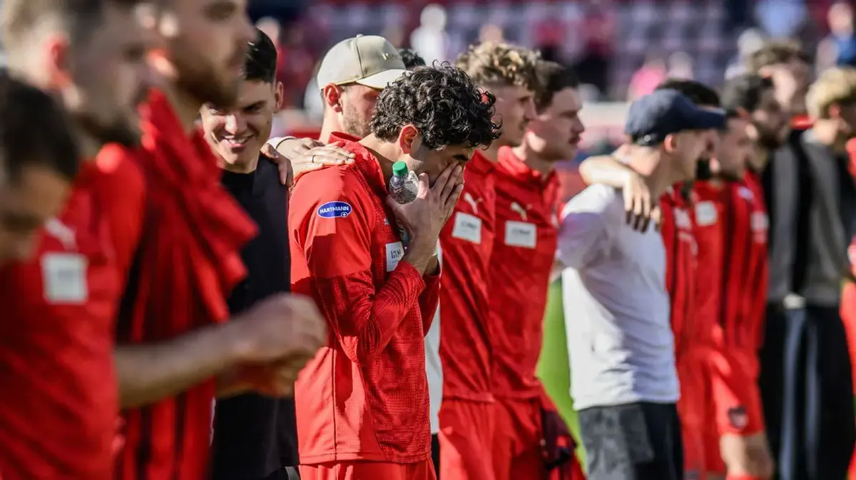 Tearful Heidenheim Striker Honors Girlfriend with Emotional Goal Dedication